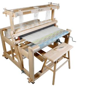 A Toika Liisa floor loom with bench.